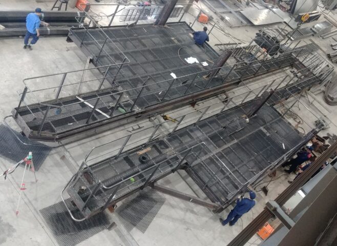 Installing work platforms at the factory.